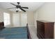 Bedroom featuring a ceiling fan, a large window and neutral paint at 1231 Hillview Rd, Hampton, GA 30228