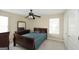 Bedroom featuring a ceiling fan, a large window and neutral paint at 1231 Hillview Rd, Hampton, GA 30228