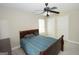 Bedroom featuring a ceiling fan, a large window and neutral paint at 1231 Hillview Rd, Hampton, GA 30228
