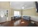 Spacious living room boasts hardwood floors, high ceilings, and natural light at 1231 Hillview Rd, Hampton, GA 30228