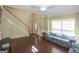 Inviting living room with hardwood floors and white trim, filled with natural light at 1231 Hillview Rd, Hampton, GA 30228