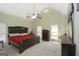 Spacious main bedroom features a vaulted ceiling, fan, and plenty of natural light at 1231 Hillview Rd, Hampton, GA 30228