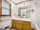 Bathroom featuring a single sink, vanity, and large mirror at 110 Thompson Blvd, Stockbridge, GA 30281