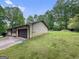 Cozy single-story home with a two-car garage, level driveway, and a well-maintained exterior, nestled in a tranquil residential area at 110 Thompson Blvd, Stockbridge, GA 30281