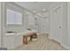 Bathroom featuring a soaking tub, glass enclosed shower, and neutral tones at 307 Owenberg Trce, Peachtree City, GA 30269