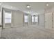 Large bedroom with hardwood floors, natural light, and a relaxing atmosphere at 307 Owenberg Trce, Peachtree City, GA 30269