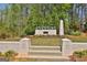 Community entrance sign displaying the community name at 307 Owenberg Trce, Peachtree City, GA 30269