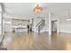 Expansive open concept with kitchen island, dining area, and spacious living area at 307 Owenberg Trce, Peachtree City, GA 30269
