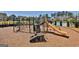 Community playground with slide and climbing equipment at 307 Owenberg Trce, Peachtree City, GA 30269