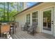 Spacious wooden deck with seating, perfect for enjoying the outdoors at 2698 Pleasant Grove Church Rd, Villa Rica, GA 30180
