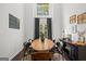 Dining area featuring high ceilings, bright windows, and contemporary decor at 2698 Pleasant Grove Church Rd, Villa Rica, GA 30180