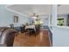Dining room featuring a long table with seating for ten and ample natural light at 1112 Haver Ct, Mcdonough, GA 30252