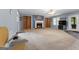Spacious living room with wood built-ins, cozy fireplace, and tons of natural light at 1112 Haver Ct, Mcdonough, GA 30252