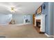 Expansive living room with fireplace, wood built-ins, and great natural light at 1112 Haver Ct, Mcdonough, GA 30252