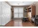 Bright office space with hardwood floors, a large window for natural light, and ample storage at 1112 Haver Ct, Mcdonough, GA 30252