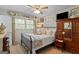 Comfortable bedroom features a bed with pillows and a dresser at 118 Duvall Dr, Stockbridge, GA 30281