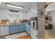 Bright kitchen featuring a stylish color scheme, stainless steel appliances, and hardwood floors at 118 Duvall Dr, Stockbridge, GA 30281