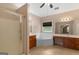 Primary bathroom featuring a glass shower, soaking tub, dual sinks and a large window for natural light at 21 Highbush Ct, Sharpsburg, GA 30277