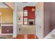 Inviting foyer with soaring ceilings and an open view to the living room with fireplace at 21 Highbush Ct, Sharpsburg, GA 30277