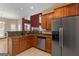 Open Kitchen featuring stainless steel appliances, granite counters, and breakfast bar at 21 Highbush Ct, Sharpsburg, GA 30277