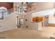Open floor plan with view of the staircase, kitchen, and breakfast area at 21 Highbush Ct, Sharpsburg, GA 30277