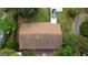 Aerial view showcasing the home's roof, surrounding greenery, driveway and a car parked in front of the house at 7336 Howard Cir, Jonesboro, GA 30236
