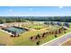 Extensive aerial view of the community featuring pickleball courts, a dog park, and a playground at 737 Myrica Ave, Locust Grove, GA 30248
