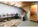 Spacious unfinished basement with exposed ceiling, office setup, and potential for customization at 215 Ridge Rd, Tyrone, GA 30290