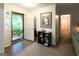 Entryway featuring a door to the front porch and an open view into the hallway and living spaces at 215 Ridge Rd, Tyrone, GA 30290