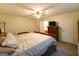 Main bedroom with queen-sized bed and dresser at 215 Ridge Rd, Tyrone, GA 30290