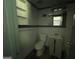 A white and gray bathroom with tile floors at 2016 Conrad Se Ave, Atlanta, GA 30315