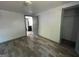 An empty bedroom with hardwood floors, closet, and neutral walls at 2016 Conrad Se Ave, Atlanta, GA 30315
