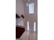 Elevated view of the foyer with a two-story entryway, white doors, and a chandelier at 1130 Ivey Ln, Mcdonough, GA 30253