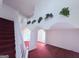 The beautiful living area has plants, archways, and a white banister at 1130 Ivey Ln, Mcdonough, GA 30253