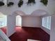 This cozy living area has an arch and plants at 1130 Ivey Ln, Mcdonough, GA 30253