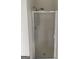 Clean, modern shower with a frosted glass door, and sleek fixtures at 1130 Ivey Ln, Mcdonough, GA 30253