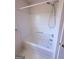 All-white shower and tub combination at 1130 Ivey Ln, Mcdonough, GA 30253