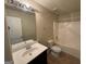 This bathroom has a single vanity, toilet, and shower/tub combo at 960 Spanish Moss Trl, Loganville, GA 30052