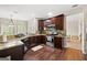 Well-equipped kitchen with granite countertops, dark cabinetry, and stainless steel appliances at 542 Creek Stone Ln, Stone Mountain, GA 30087