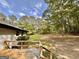 Enjoy the view from this wooden deck to a spacious backyard, with lush trees, offering peace and privacy at 15 Laurie Ln, Covington, GA 30016