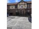 Charming townhouse exterior with brick facade, timber accents, and well-maintained landscaping at 3209 Abbeywood Dr, Decatur, GA 30034
