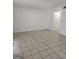 Spacious living room featuring tiled flooring and neutral paint at 3209 Abbeywood Dr, Decatur, GA 30034
