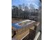 Backyard view of the in-ground pool that is covered for winter at 3209 Abbeywood Dr, Decatur, GA 30034