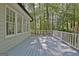 Wide shot of the backyard deck with the windows of the house at 110 Greenridge Ct, Fayetteville, GA 30215