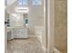 Bright bathroom with tile floors, double vanity, and a separate shower and tub at 110 Greenridge Ct, Fayetteville, GA 30215