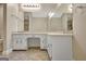 Bathroom featuring a double sink vanity, tile floor, and ample lighting at 110 Greenridge Ct, Fayetteville, GA 30215