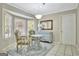 Bright breakfast nook with bay windows and vintage furnishings, perfect for enjoying morning coffee at 110 Greenridge Ct, Fayetteville, GA 30215