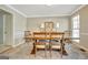 Formal dining room features a large wooden table and neutral wall color at 110 Greenridge Ct, Fayetteville, GA 30215
