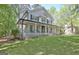 Traditional two-story home featuring a large, inviting wraparound porch at 110 Greenridge Ct, Fayetteville, GA 30215