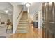 Grand foyer with hardwood floors, staircase, and elegant design at 110 Greenridge Ct, Fayetteville, GA 30215